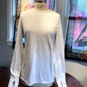White long sleeve t shirt with thumb holes and lace back. Slim fitted.